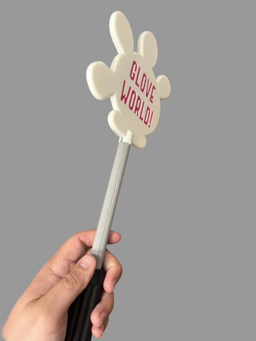 Hand holding a wand with 'Glove World!' text